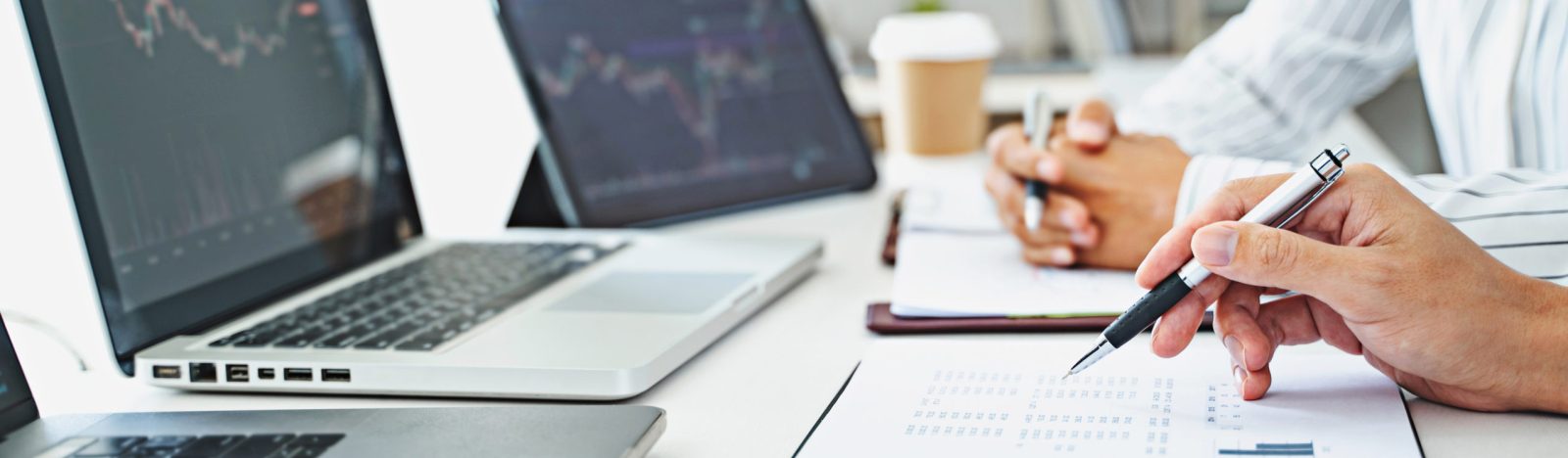 Investor calculating profits on stock market exchange Investment planing and strategy concept. Financial data analysis graph stock business